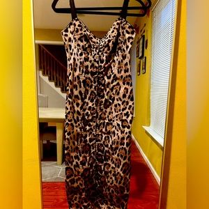 Dolce & Gabbana Midi Leopard dress: retails for $2,545 currently on site